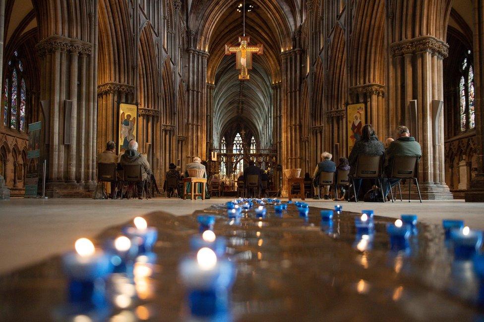 Church goers attend a service in Lichfield Cathedral