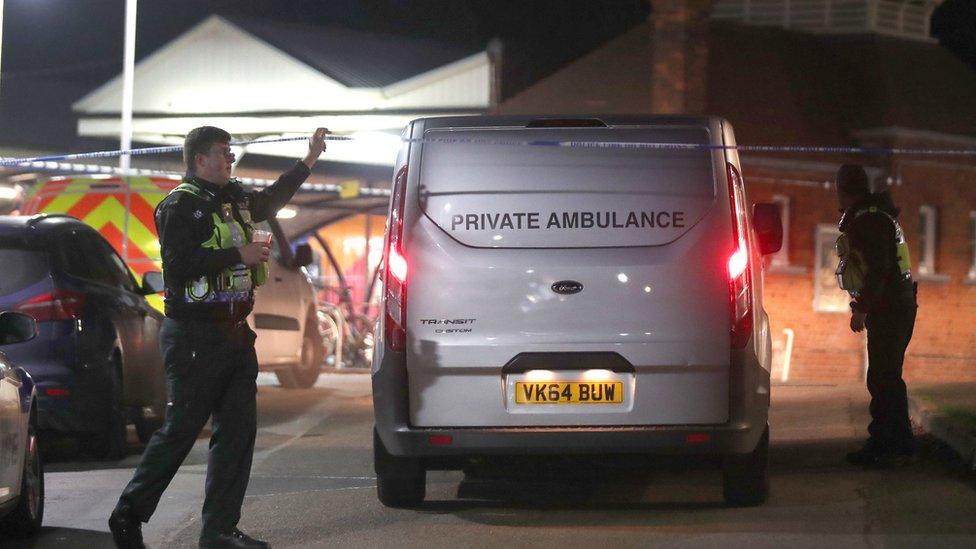 A private ambulance arrives at Horsley station near Guildford