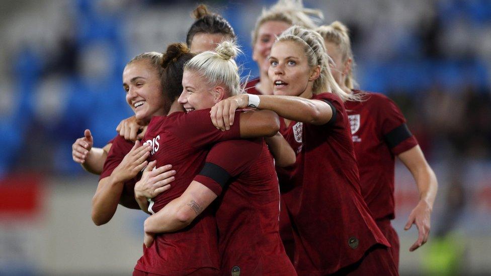 England celebrate goal.