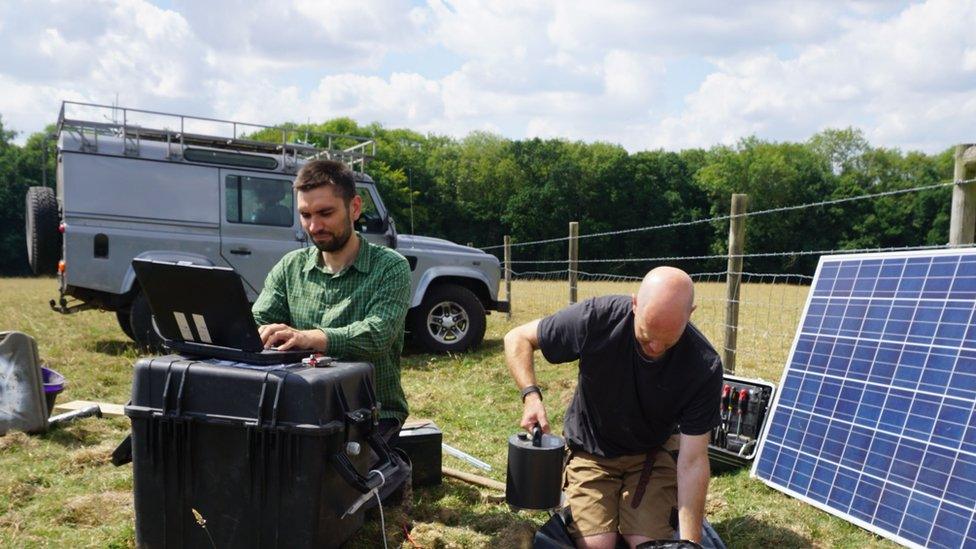 Stephen Hicks installing monitoring equipment