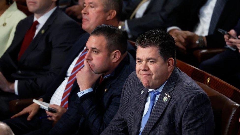 Don Bacon (left), Anthony D'Esposito (centre) and Nick LaLota (right) sit in the House chamber