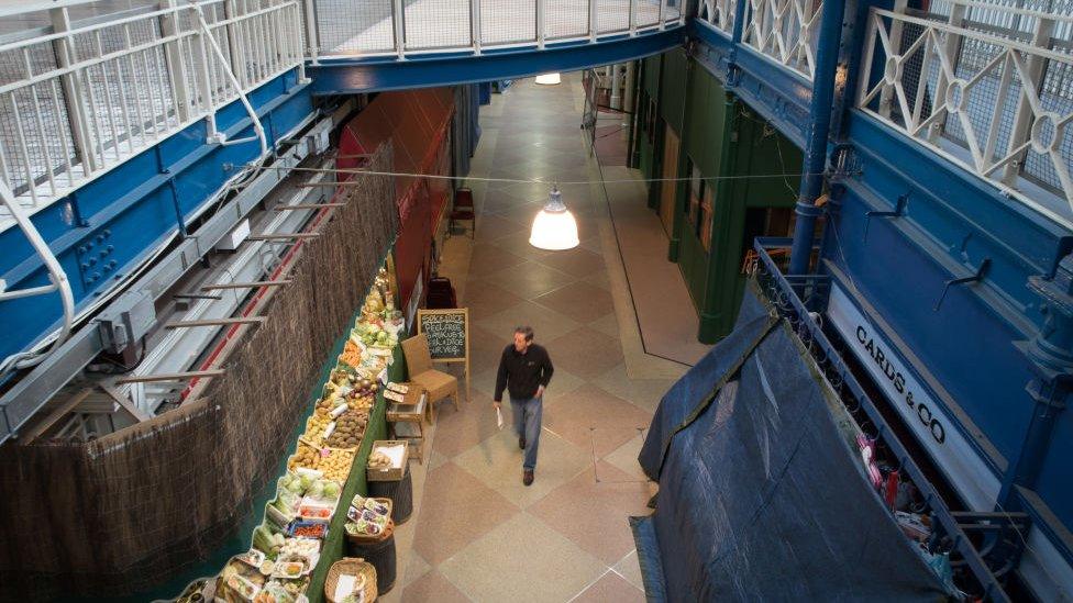 A man in Newport market