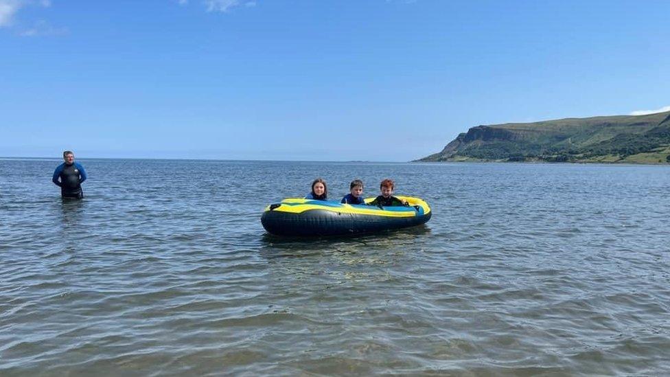 Fun in the sea at Waterfoot, by