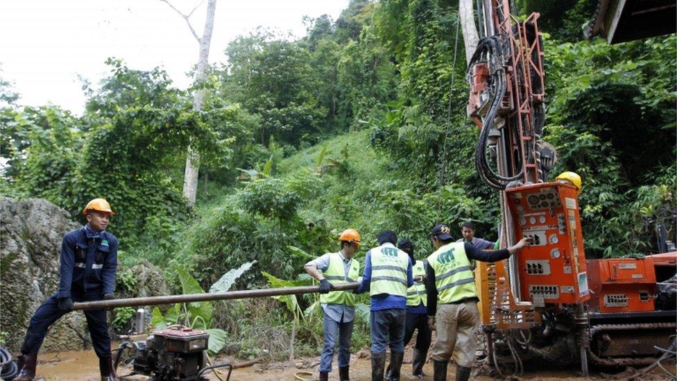 Authorities in Thailand trying to drill holes to release flood waters from the cave complex June 2018