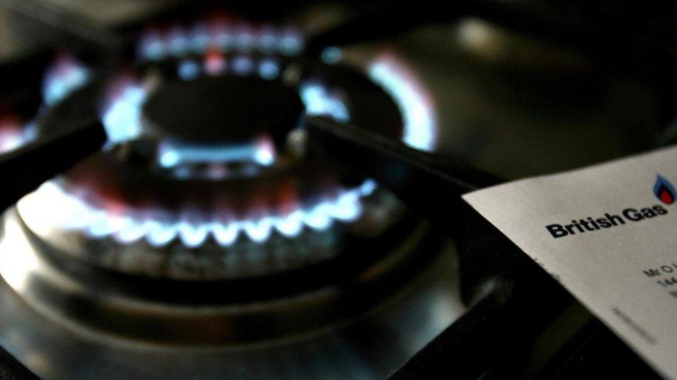 A gas hob with a bill from British Gas