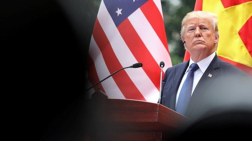 President Donald Trump attends a news conference at the Presidential Palace in Hanoi, Vietnam, November 12, 2017.