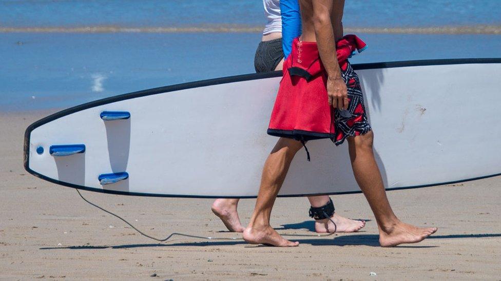 Man with a surfboard