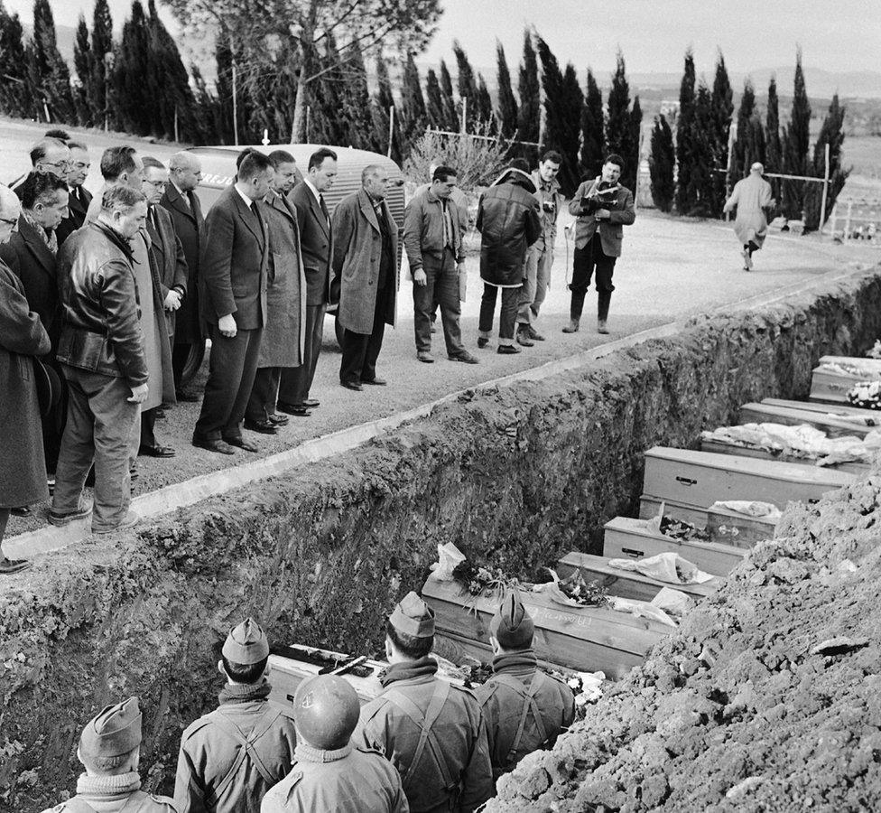 French politicians visit the cemetery at Frejus, where victims of the the Malpasset Dam collapse were buried