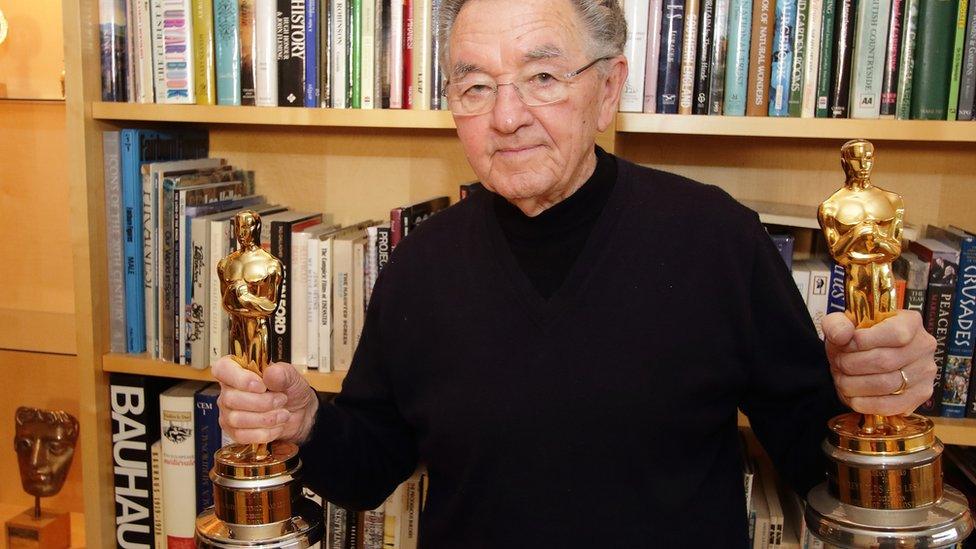 Norman Reynolds with his two Oscars