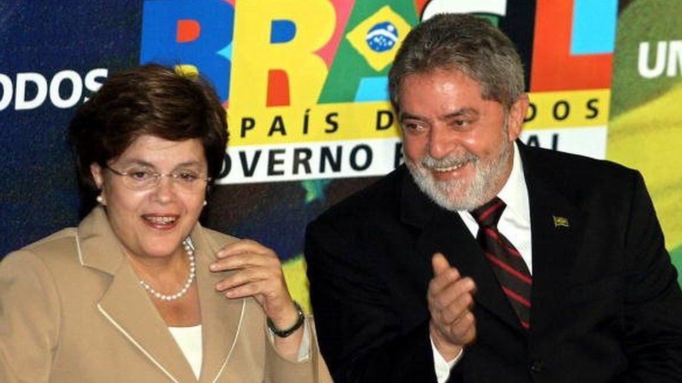 Brazilian President Luiz Inacio Lula da Silva (eight) and her new Chief of Cabinet Dilma Rousseff appear during the latter's swearing in ceremony 21 June, 2005 at the Planalto Palace in Brasilia.