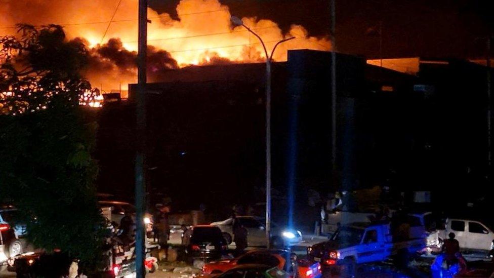 Flames from unrest in Papua New Guinea earlier this year