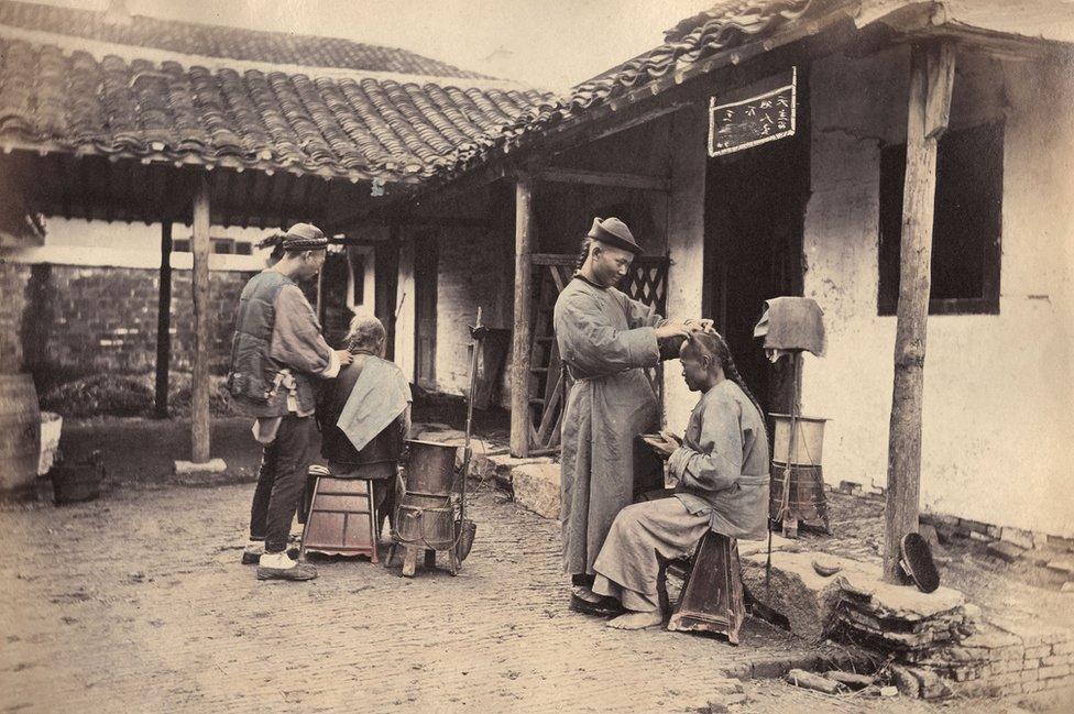 William Saunders, Itinerant Barbers, 1860s-1870s. Hand-tinted albumen silver print. No. 24 in Sketches of Chinese Life and Character series