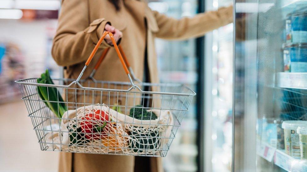 Woman buying groceries