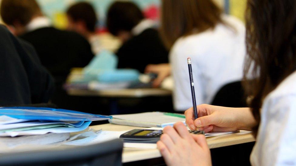 student at desk