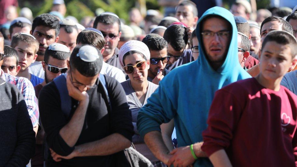 People mourn during the funeral of Israeli Rabbi Ahiad Ettinger in the Jewish settlement of Eli (18 March 2019)