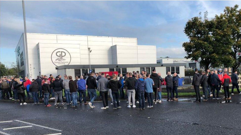 Protesters outside Green Pastures Church in Ballymena