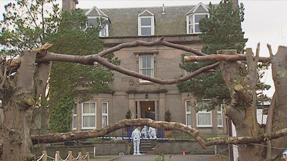 Forensics officers at the Wilson family home