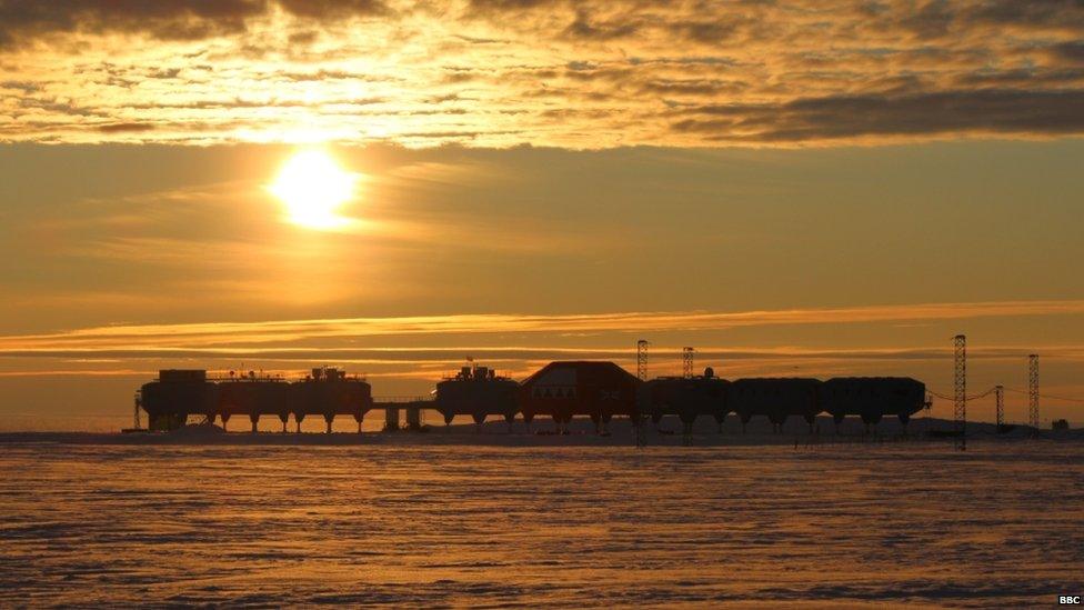 Halley in the far distance, with the sun low in the sky behind