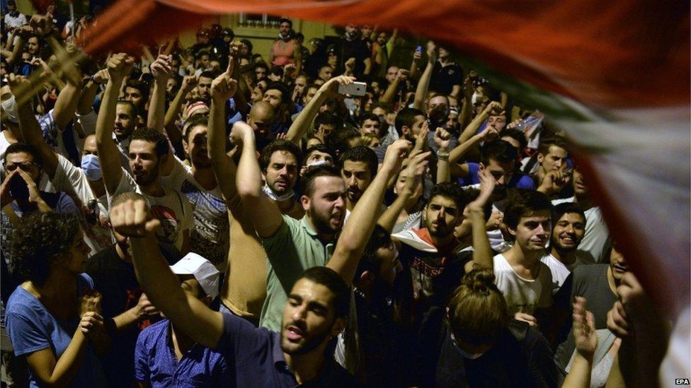Lebanese activists shout slogans during a protest outside Government palace at downtown Beirut, Lebanon, 9 September 2015