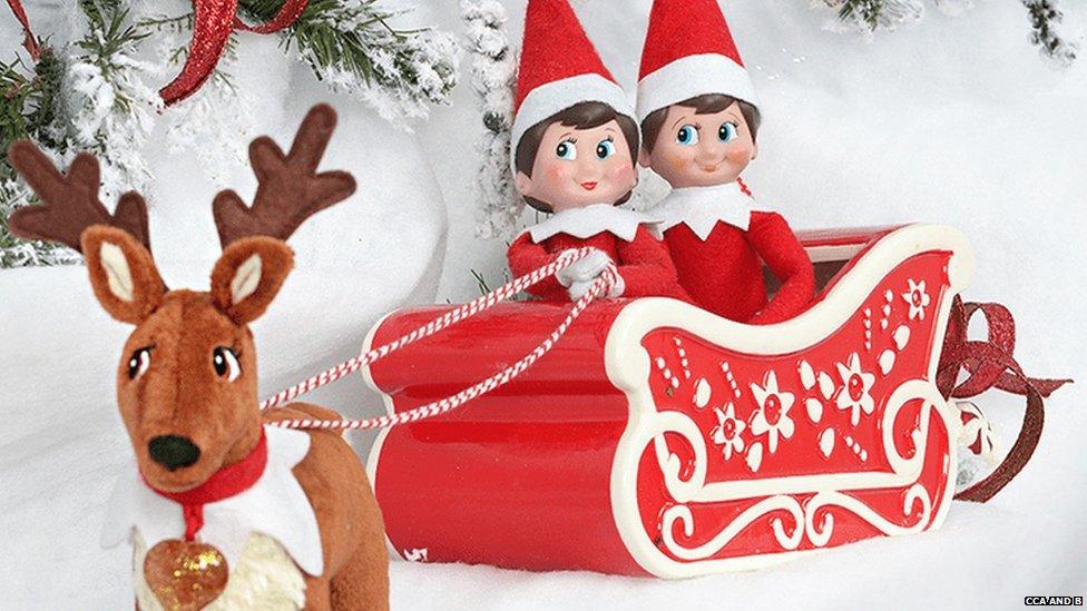 Elf on a Shelf in a sleigh