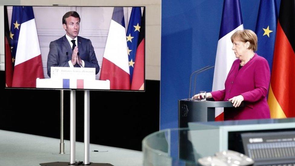 German Chancellor Angela Merkel holds a joint video news conference with French President Emmanuel Macron in Berlin