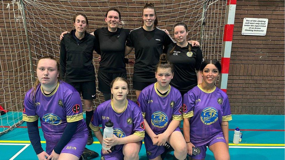 FC United of Wrexham women's team show off their new kit after Wrexham owner Ryan Reynolds donated £1,600 to the club's online funding page