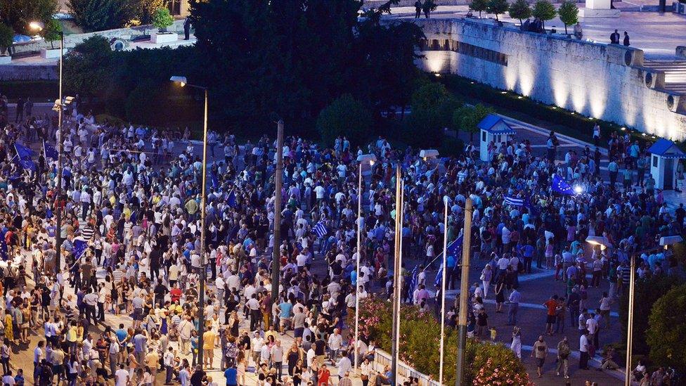 Pro-European Union protesters gather in front of the Greek parliament in Athens in July