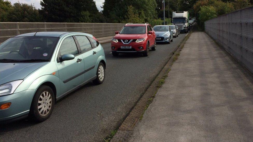 Traffic on a bridge over the M3