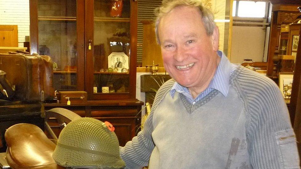 Allan Blackburn with antique items