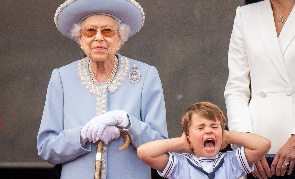 The Queen with Prince Louis and the walking stick