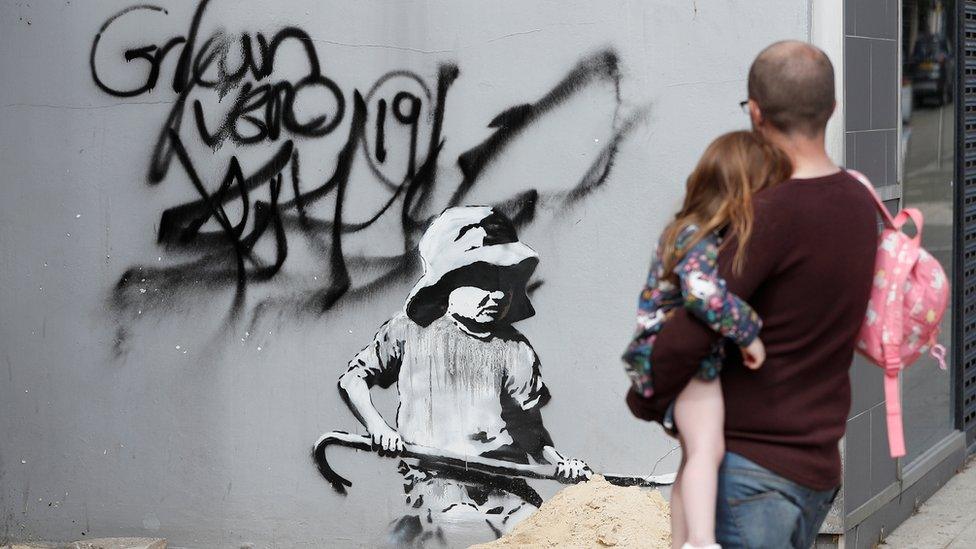 Artwork believed to be created by Banksy is seen in Lowestoft