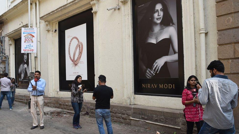 Indian media outside a Nirav Modi store