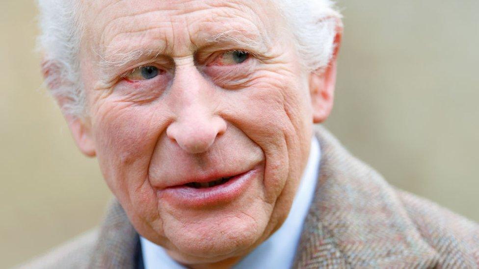 King Charles wears a sandy-coloured overcoat and white shirt while attending a service at the Church of St Mary the Virgin, close to the Sandringham Estate in Norfolk, England, on 26 January, 2025.