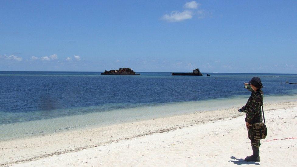 Someone standing on a beach - South China Sea