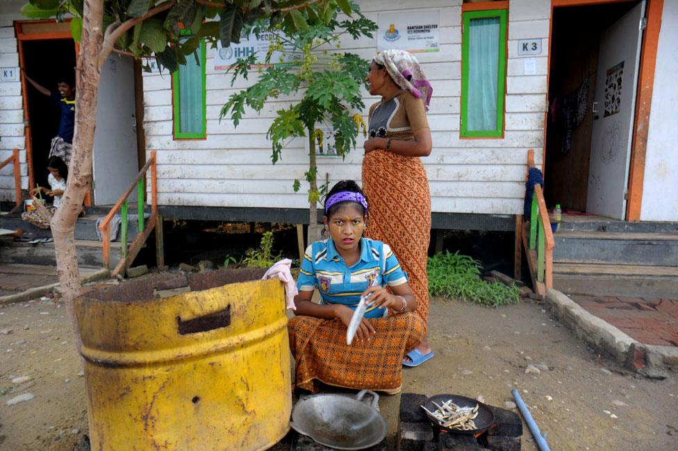 Rohingya women working at the Rohingya housing complex in Blang Ado, North Aceh