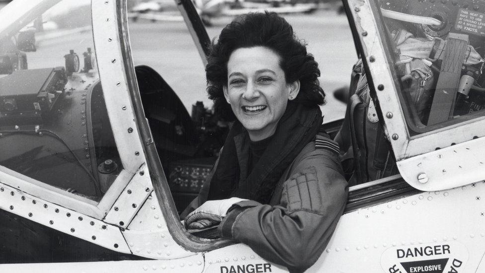 Julie in a plane cockpit