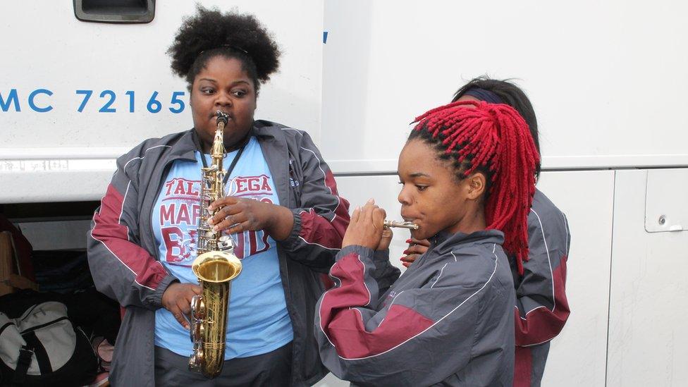 Elkena Washington on the E-flat alto saxophone and Melissa Harris on piccolo