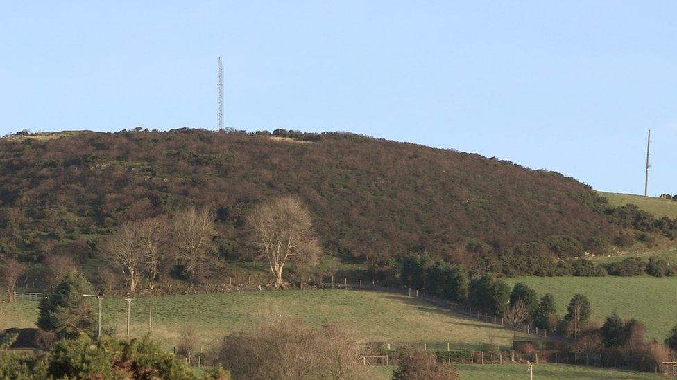 A separate broadband mast was erected next to the cairn last month, without planning permission