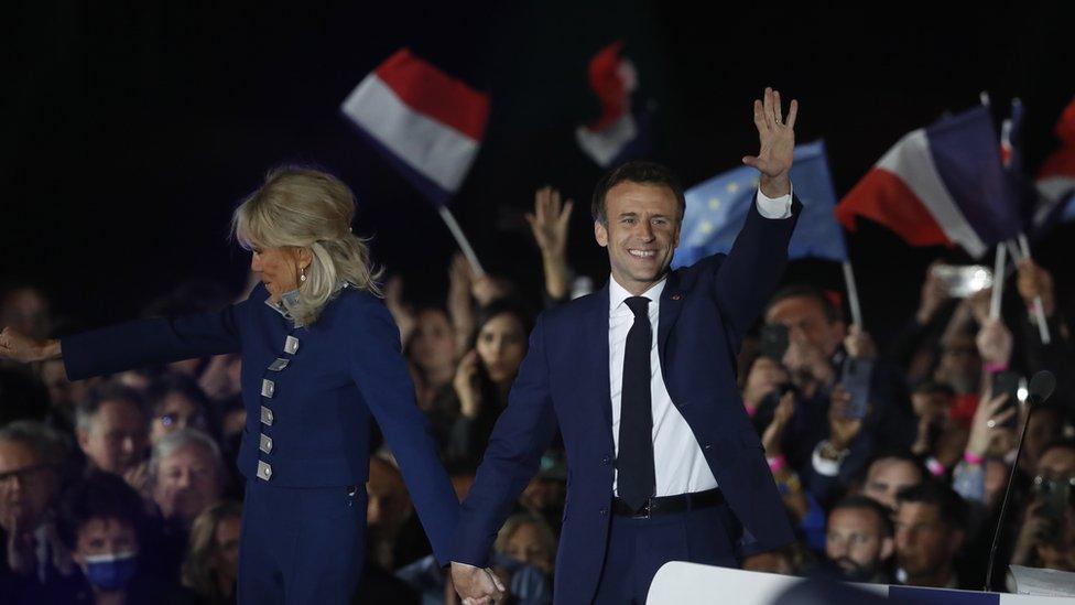 Emmanuel Macron seen at a victory rally with wife Brigitte Macron