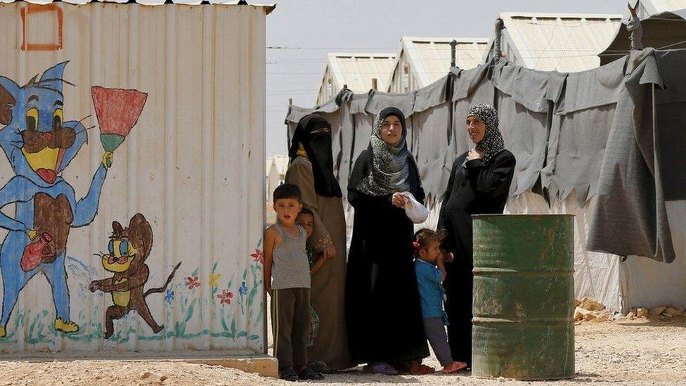 Women in a Syrian refugee camp