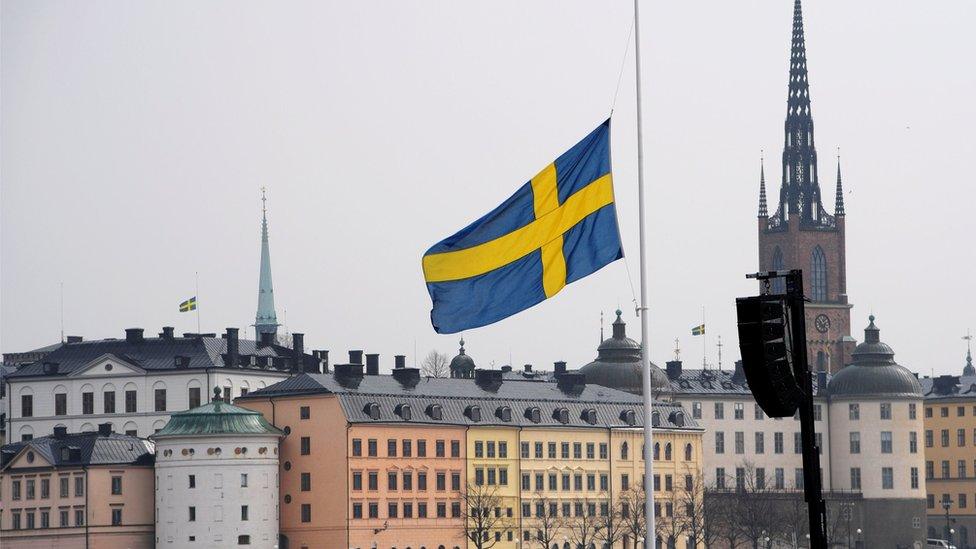 Flag at half mast at the official ceremony at Stockholm City Hall with one minute of silence at noon to remember the victims of Friday"s terror attack on Drottninggatan