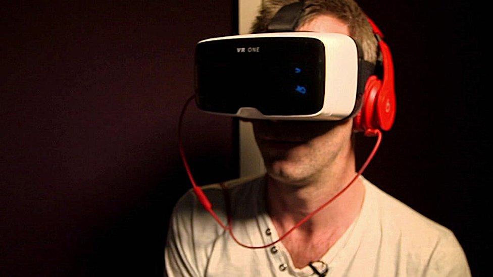 A person wearing a virtual reality headset