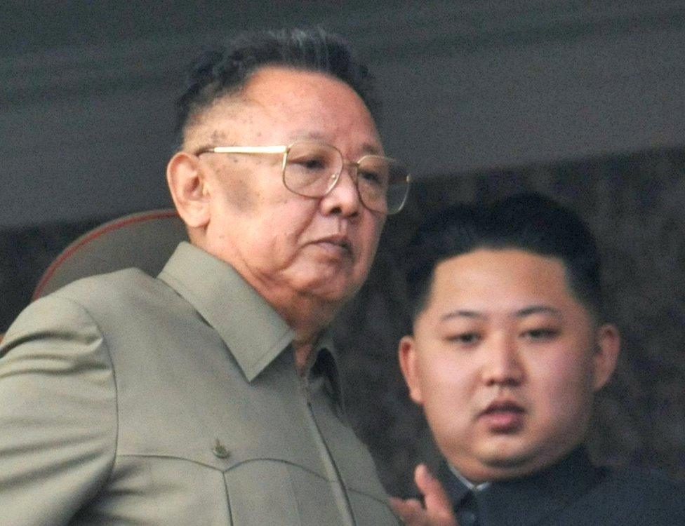 North Korean leader Kim Jong-il (L) walks in front of his youngest son Kim Jong-un as they watch a parade to commemorate the 65th anniversary of the founding of the Workers" Party of Korea in Pyongyang in this October 10, 2010