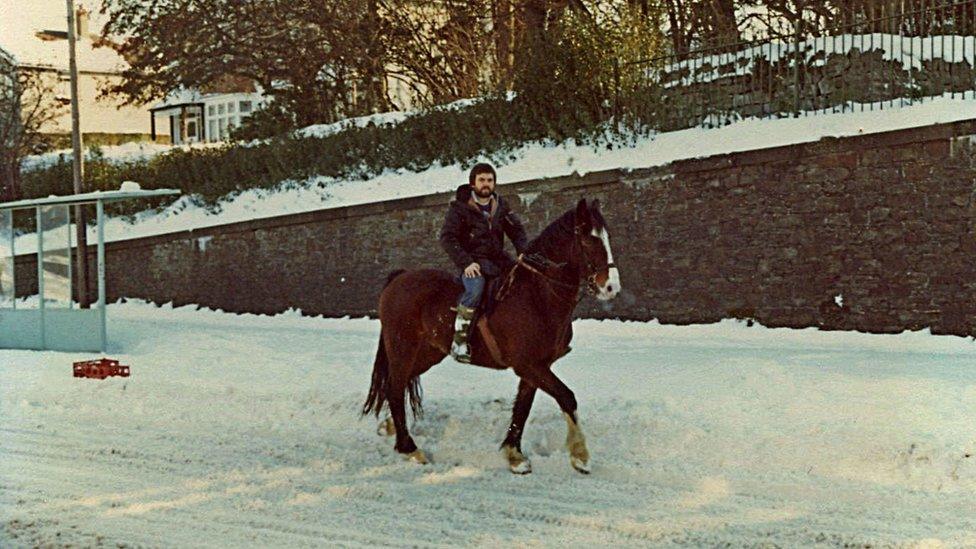 Man on horse in snow in Swansea - 1981