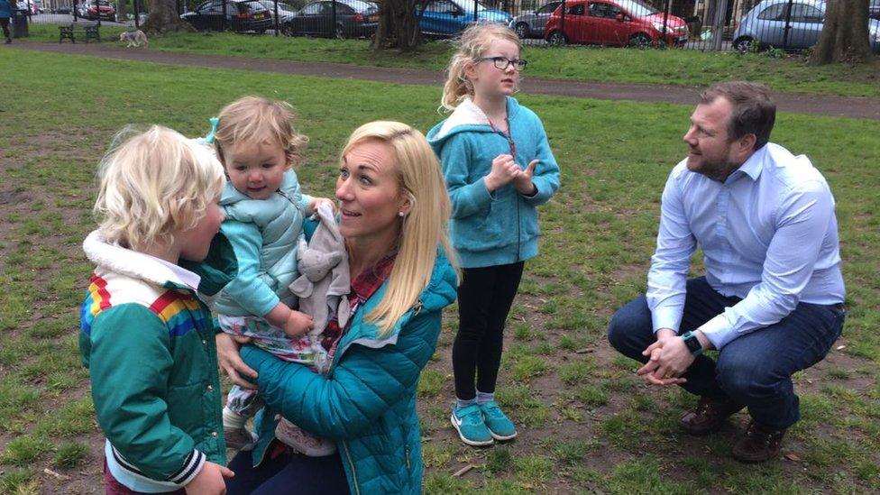 Fran Caunt playing in the park with son Johny, four, daughters Bronwyn, one, Carys, seven, and husband Dan