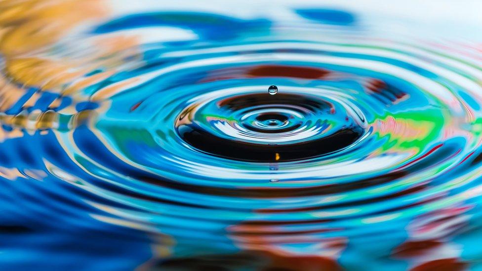 Image shows a ripple in water