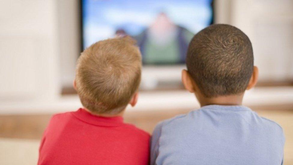 Children watching TV