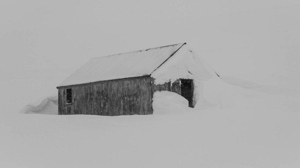 Old Aberdeen ski hut in snow