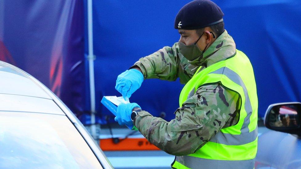 Soldier carrying out Covid test