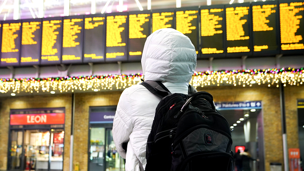 Person at train station